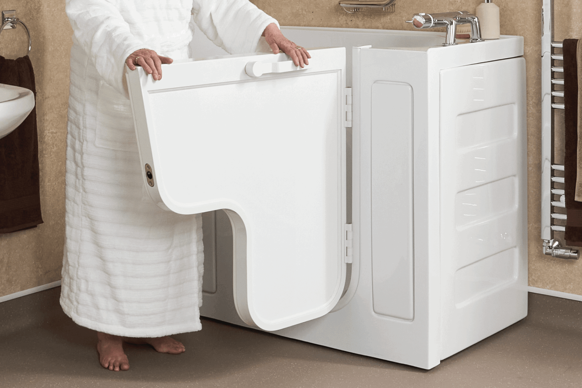 Person opening the wide door of a wheelchair accessible bath